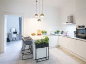 View of the kitchen looking towards the terrace