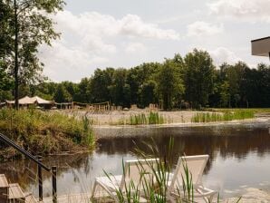 Modern lodge on the water in a holiday park - Ermelo - image1