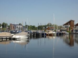 Holiday park Holiday home with jetty near Amsterdam - Uitgeest - image1