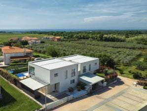 Ferienhaus in Novigrad mit Pool am Strand - Karigador - image1