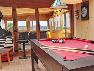 Wintergarten mit Billard und Dart