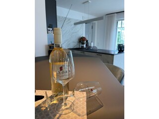 Begrüßung mit Wein