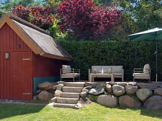 Terrasse und Saunahaus