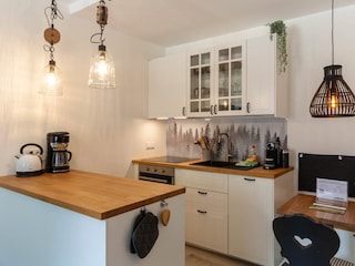 Wohn-/Schlafbereich mit offener Küche