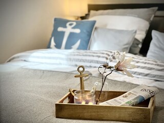 Detail bedroom 1 with box-spring bed