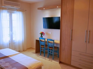 The bedroom is fully equipped