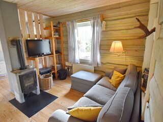 Sofaecke mit TV und Kaminofen