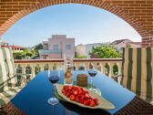 Roofed and furnished balcony