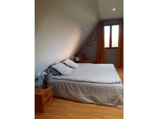 Large bedroom possibility of 3 single beds or double be