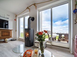 direkter Blick vom Sofa auf das Ostseewasser, Ferienhaus Boje by Seeblick Ferien ORO