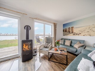 holzbefeuerter Kamin und direkter Wasserblick im Lieblingsplatz by Seeblick Ferien ORO