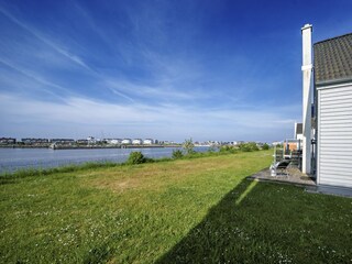 Terrasse 2 mit direktem Blick auf das Wasser, Ferienhaus Lieblingsplatz, Ostseeresort Olpenitz