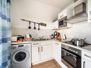 Waschmaschine in der Fewo Räuberhöhle by Seeblick Ferien ORO