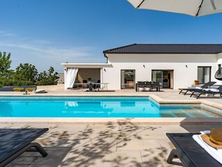 Pool area with sun deck area