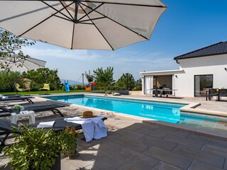 Pool area with sun deck area