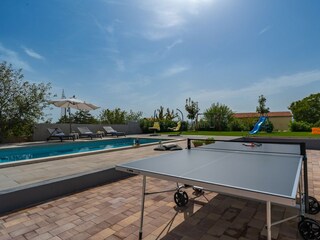 Pool area with table tennis