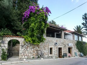 Villa Mirjana - One Bedroom Apartment with Terrace and Side Sea View (Taverna) - Mlini - image1