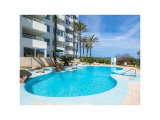 Bathing and sunbathing by the pool