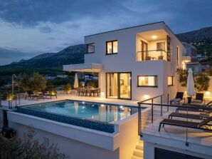 NEW! Stylish Villa Olea with heated pool and panoramic sea views