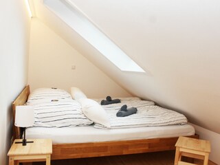Schlafbereich mit Doppelbett (180x200cm)
