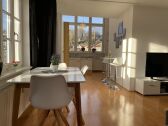 General view - dining table, café bar, panoramic window