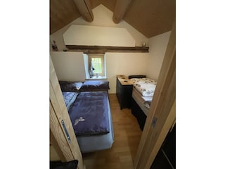 Wohn-/Schlafzimmer mit 1, 2 oder 3 Betten