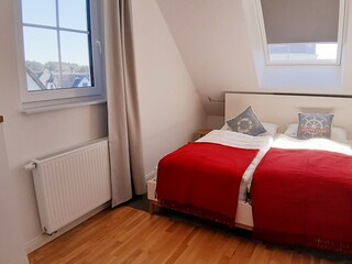 Schlafzimmer mit Doppelbett