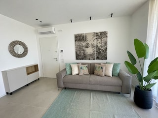 Wohnzimmer mit Kochnische