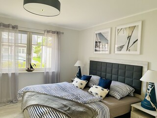 Schlafzimmer mit Doppelbett