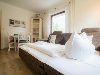 Wohnzimmer mit Schlafsofa