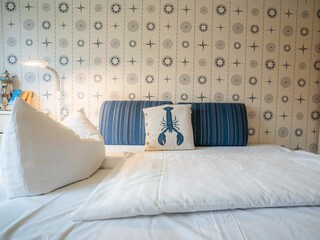 Wohnzimmer mit Schlafsofa