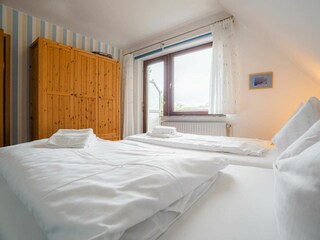 Schlafzimmer mit Balkon