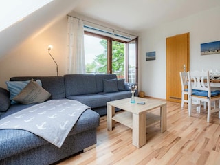 Wohnzimmer mit Balkon