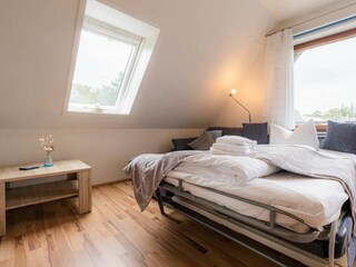 Wohnzimmer mit Schlafsofa