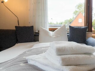 Wohnzimmer mit Schlafsofa