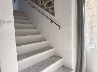 All the stairs are covered in marble