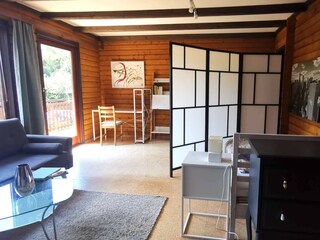 Wohnzimmer mit Ausgang auf den Balkon