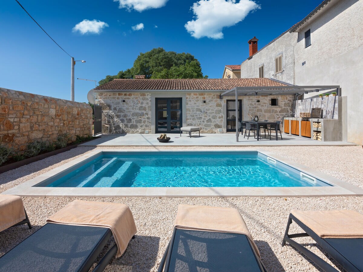 Swimming pool and kitchen