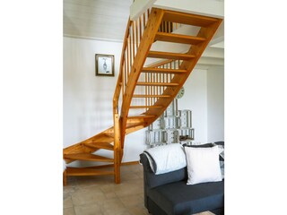 Treppe zum Schlafbereich auf der Empore