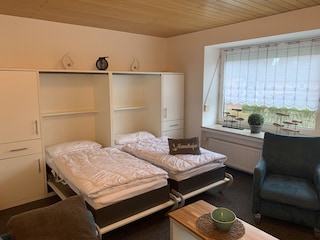 Schlafmöglichkeit Wohnzimmer