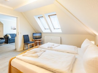Schlafzimmer mit Doppelbett