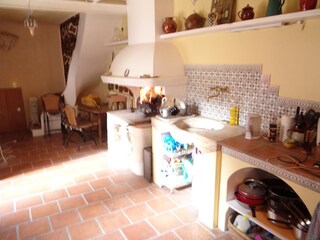 Kitchen and the open fireplace