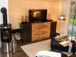 Wohnzimmer mit Kamin