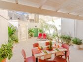 Patio with dining table.