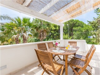 Balcony with dining table