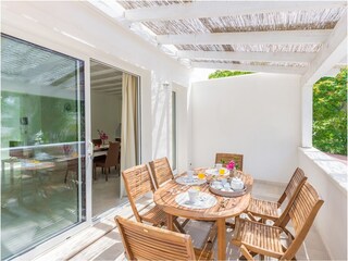 Balcony with dining table