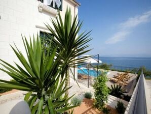 caravane Apartments Villa Grlica - One Bedroom Apartment with Terrace and Sea View (A1) - Sutivan - image1