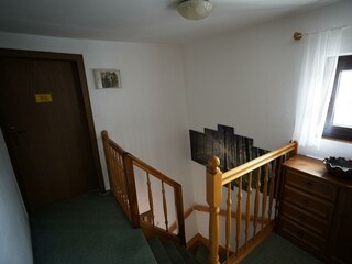 Treppe in den 1. Stock