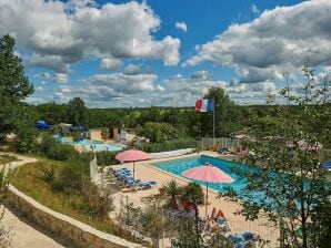 Vakantiepark Bungalow met terras op een heuvel in Dordogne - Fumel - image1