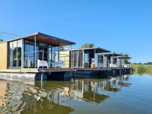 Hausboot Komfortables Haus am Wasser für 2 Personen am Meer - Podamirowo - image1